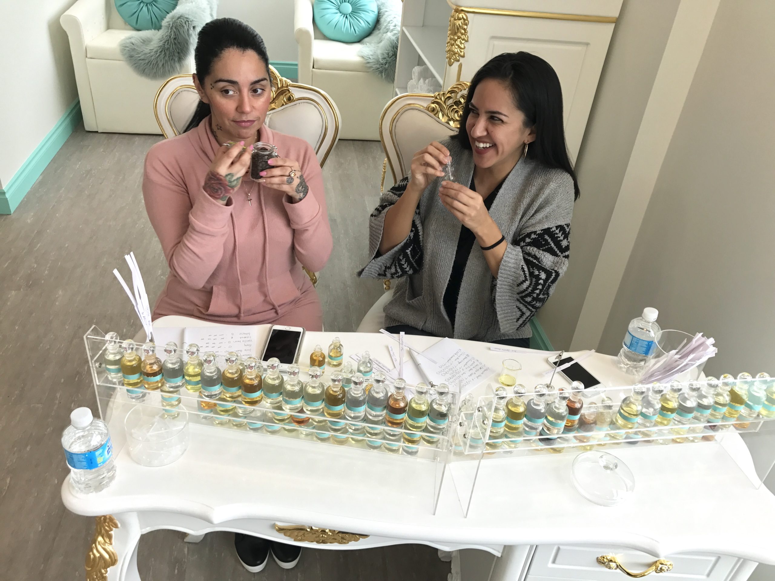 eyelashes two women indulging in the art of custom perfumery
